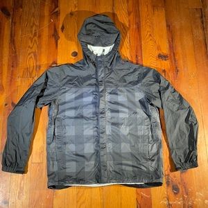Men’s checkered North Face HyVent 25L raincoat. Size large.